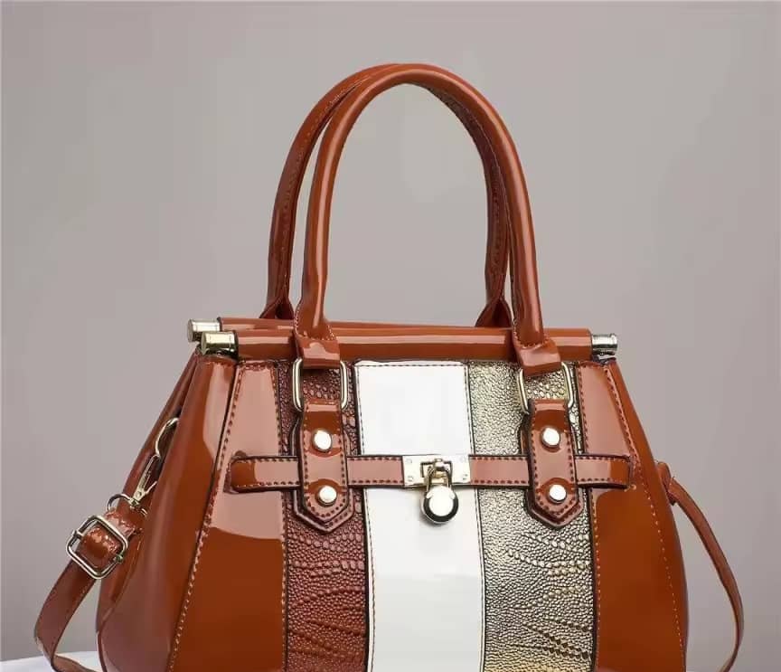 Cognac patent tote with white and gold striped panels