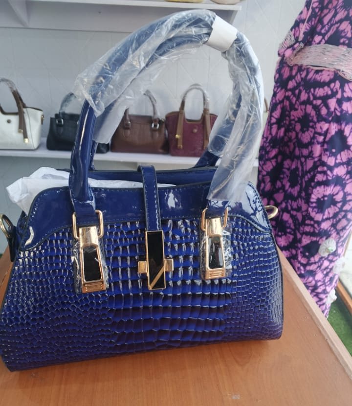 Cobalt blue crocodile-embossed pillow satchel